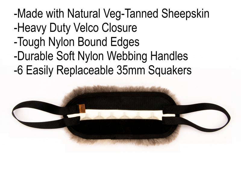 Load image into Gallery viewer, Sturdy Sheepskin Dog Tug with Handles and Replaceable Squeaker Pocket - Interactive Training &amp; Motivation Toy

